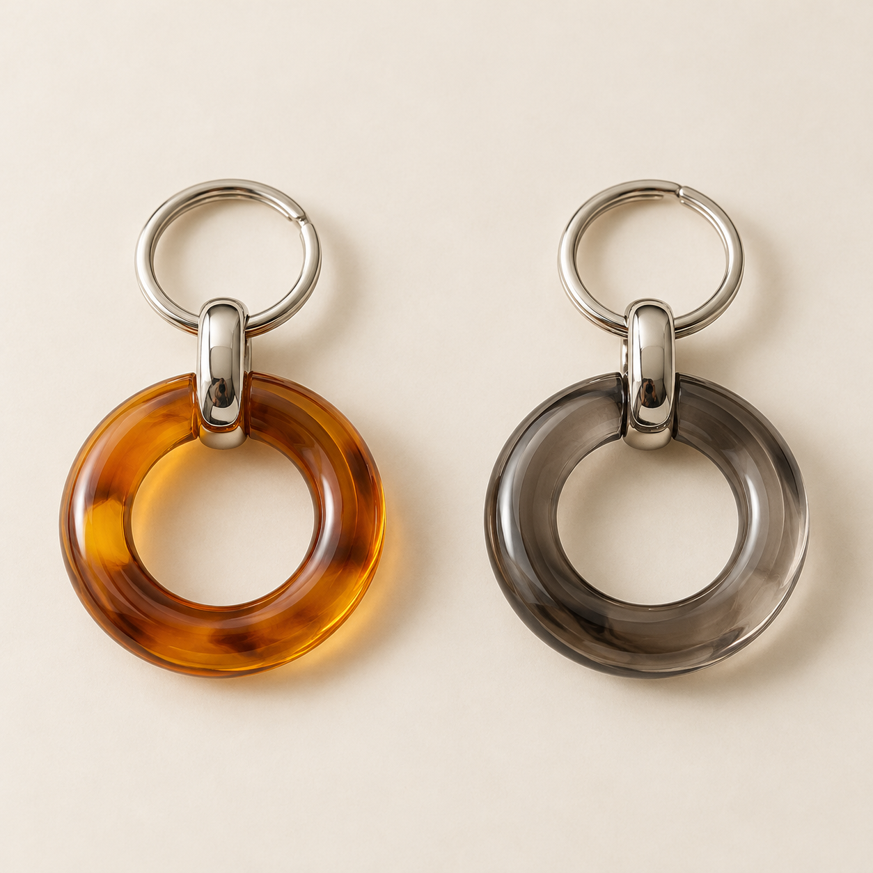 Orbit Key Charm, shown in Amber and Smoke